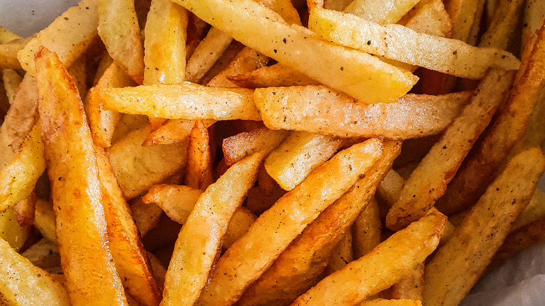 French fries boiling in oil