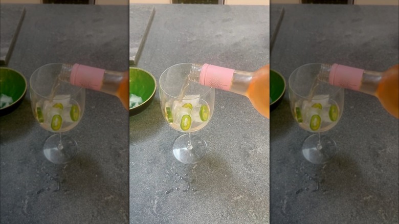 Rosé pouring chilled jalapeno glass