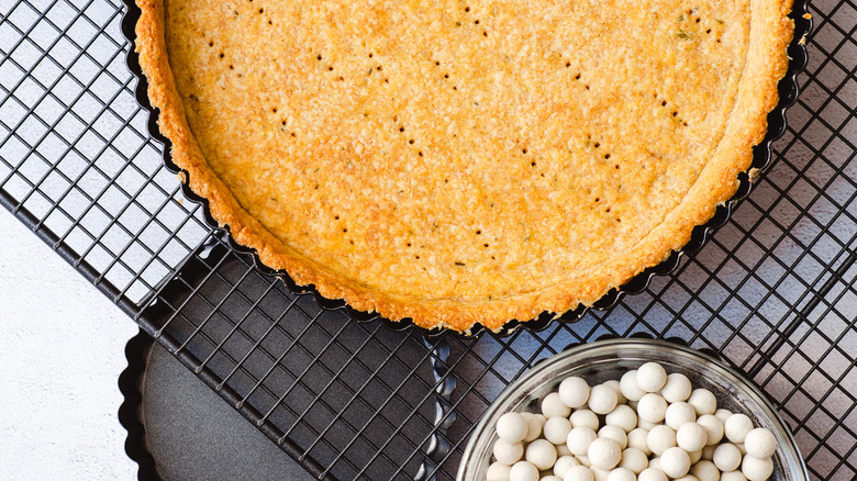 Docked pie crust with pie weights