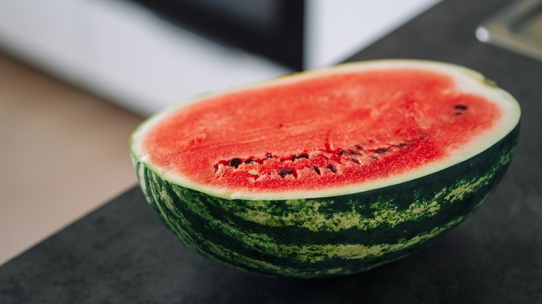 Whole and sliced watermelon