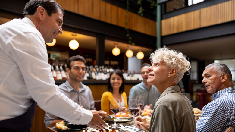 waiter serving table