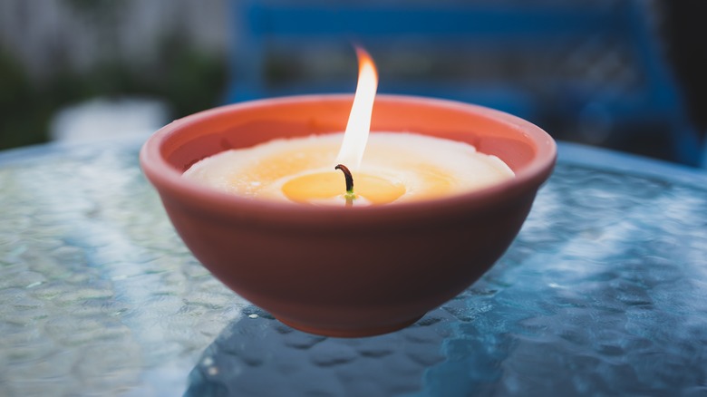 Burning citronella candle