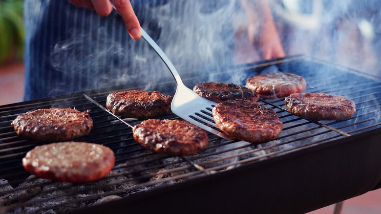 Beef patties on the grill