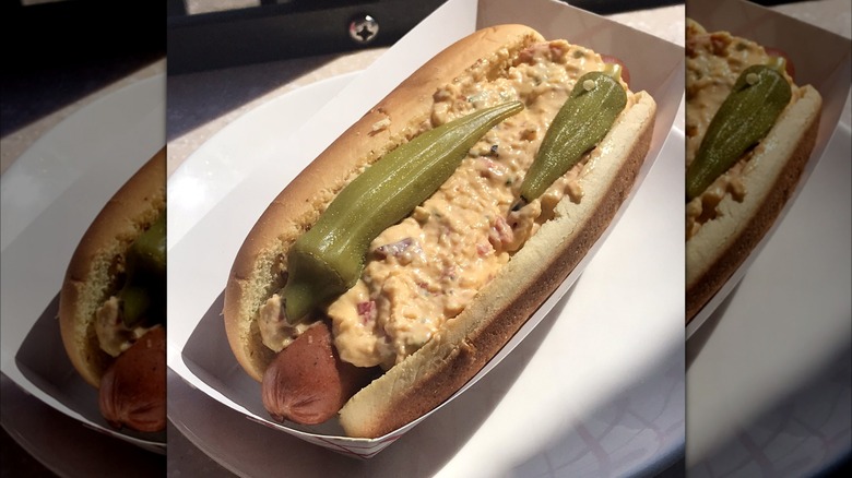 Pimento cheese hot dog with pickled okra