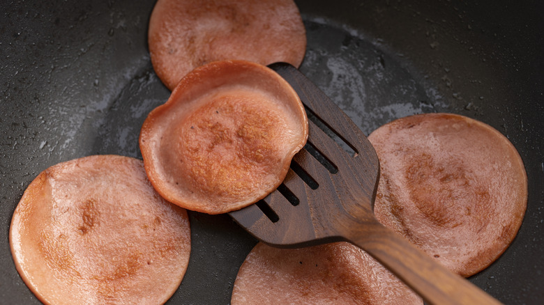 Fried bologna in the pan