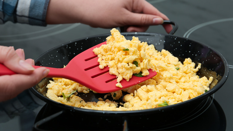 Scrambled eggs with spatula