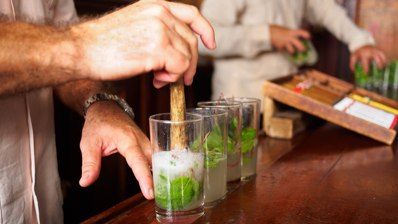 mixing mojitos in Havana