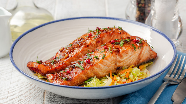 Glazed salmon in a bowl with garnish