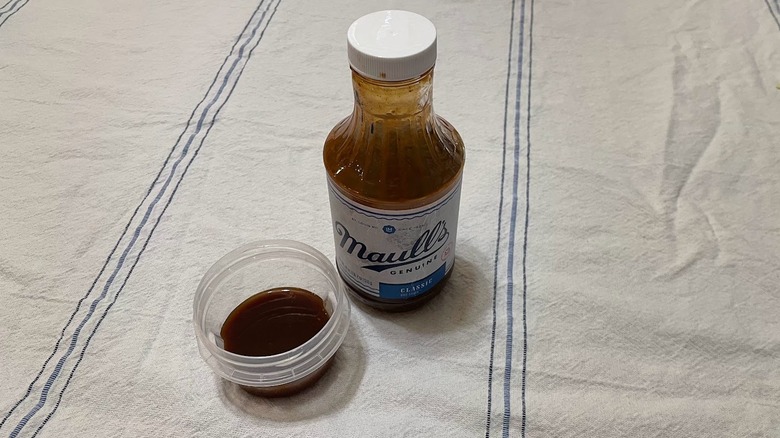 Maull's barbecue sauce in a cup