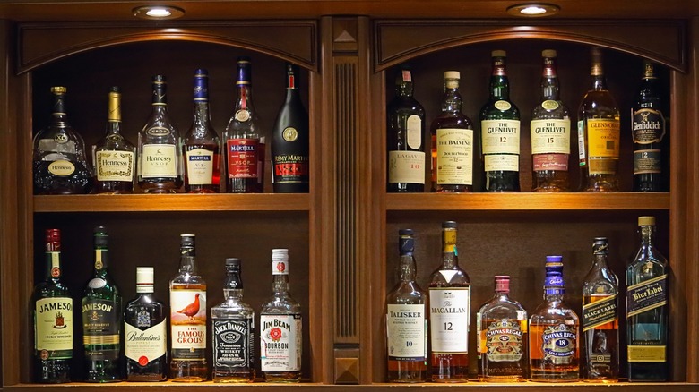 Various liquors in a cabinet
