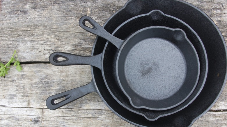 Cast iron pans stacked 