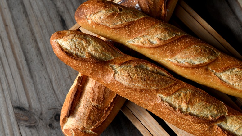 baguettes laid out on wood