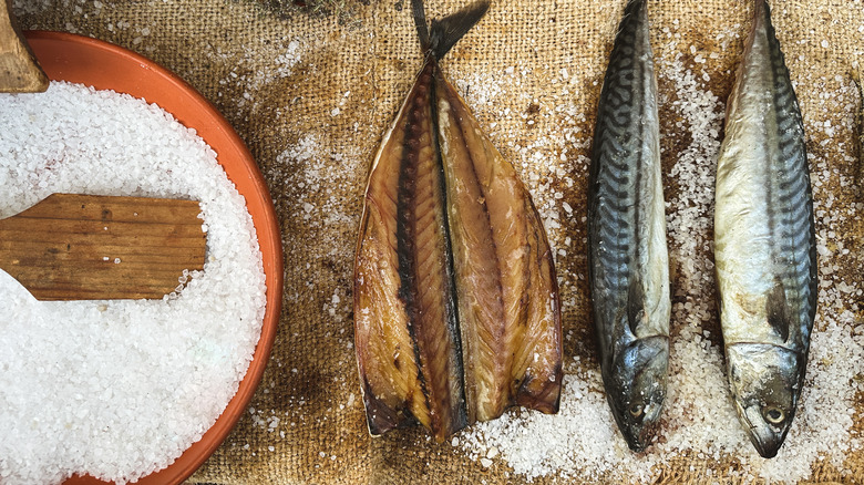 Salt-cured fish in rock salt