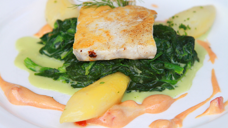 White fish with spinach and sauce Choron