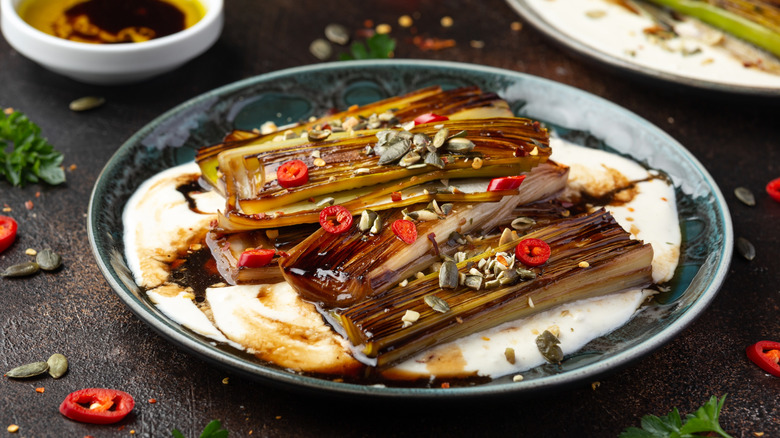 Whipped feta under braised leeks