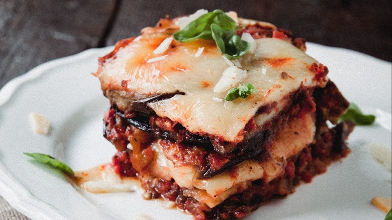 Grilled eggplant Parmesan on a white platter