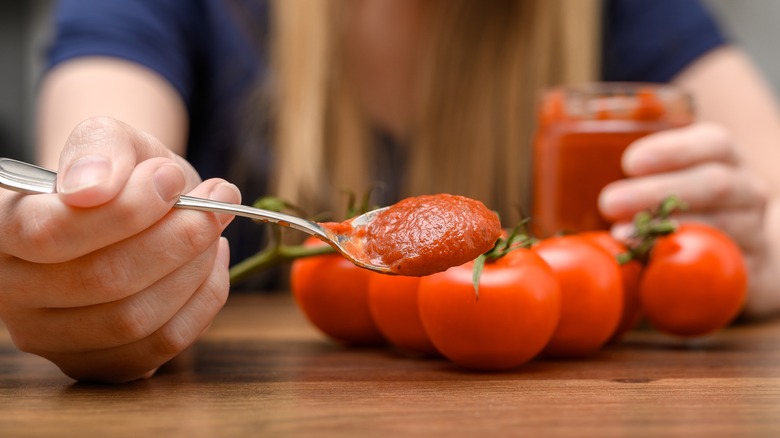 Homemade ketchup on a spoon