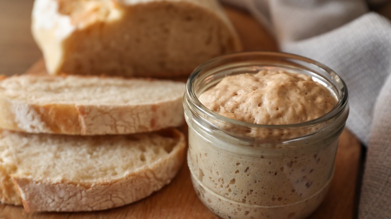 Sourdough starter and sliced bread