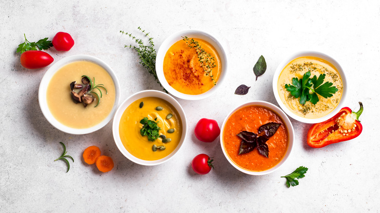 A variety of soups in bowls