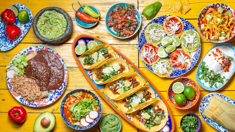 Spread of Mexican dishes and dips