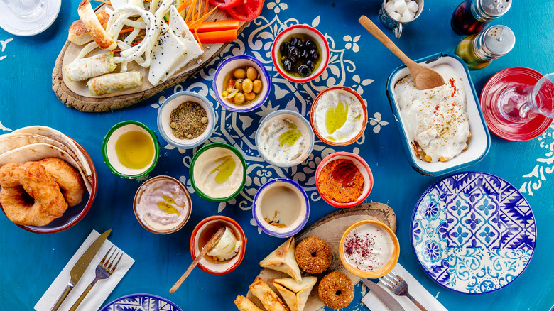 A mezze feast with several dips