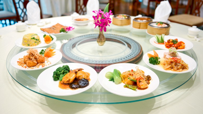 Round table with Lazy Susan and Chinese dishes