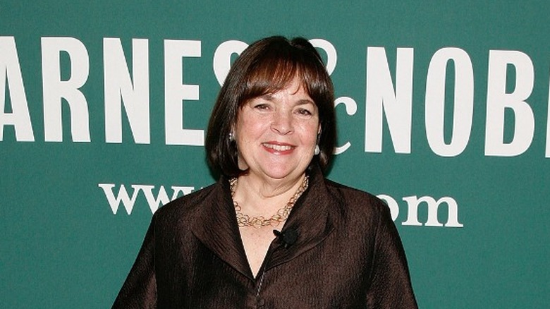 Ina Garten smiling in front of a Barnes and Noble sign