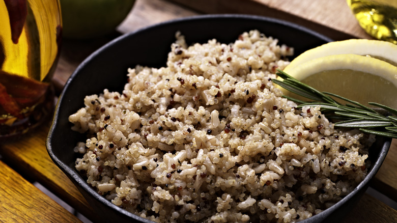 a bowl of brown rice with lemon