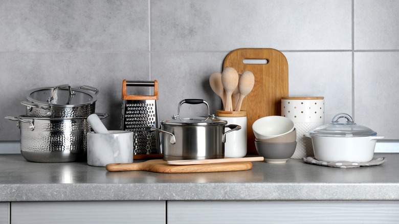 Assorted cookware on a gray counter