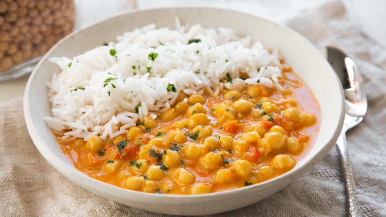 Coconut chicken curry on a gray surface