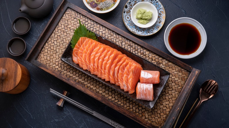 raw salmon arranged on platter