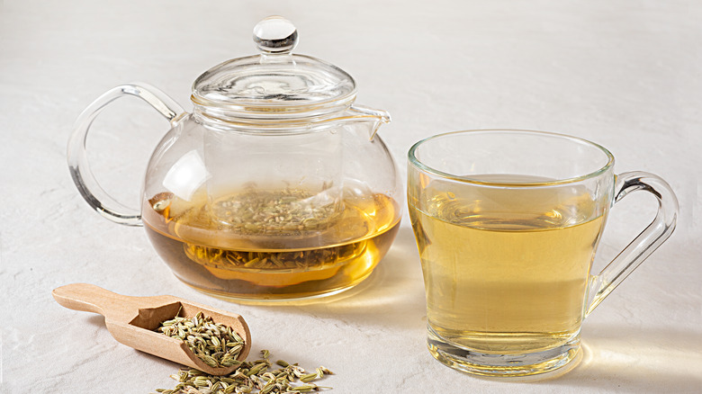 Teapot and cup with fennel