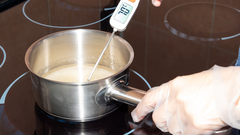 Candy thermometer in boiling pot