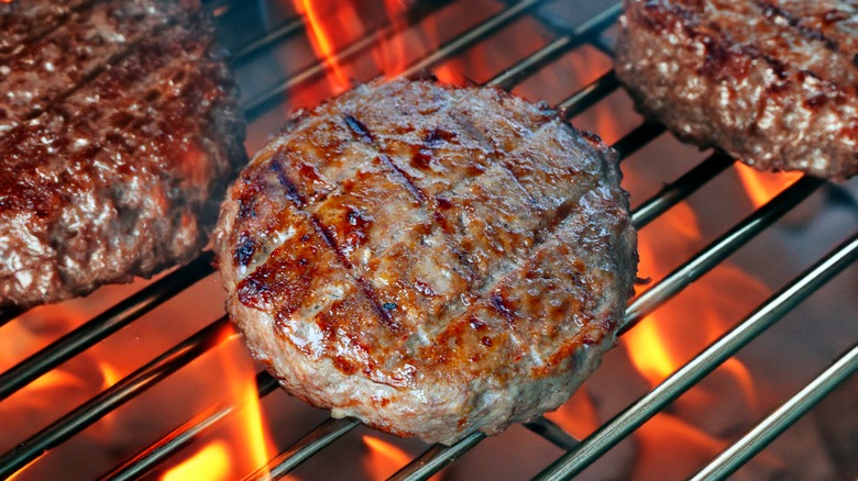 Hamburger patties on grill