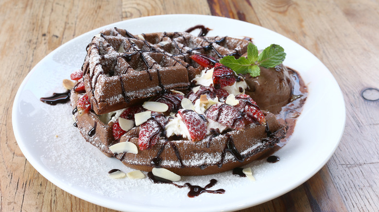 Chocolate waffles with herbs and almonds