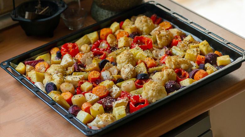 Tray of roasted vegetables on kitchen counter