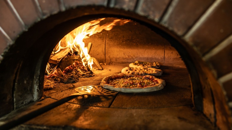 Pizza in a wood-fired brick oven