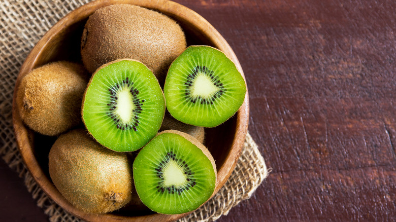 Kiwis in wooden bowl