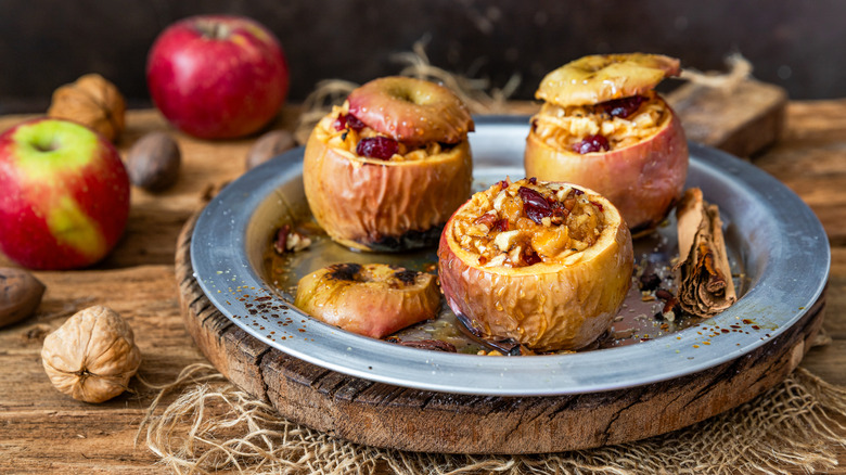 baked apples on a plate with spices