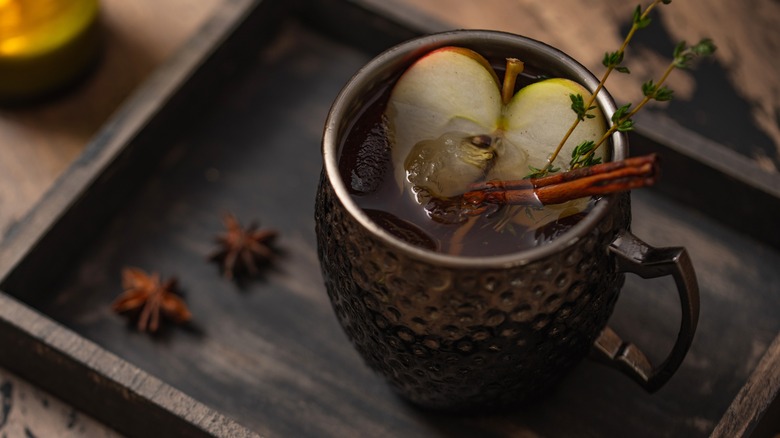 Cocktail with apples and cinnamon