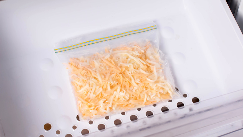 Frozen shredded cheese in a freezer