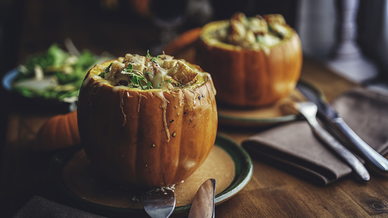 Two stuffed pumpkins