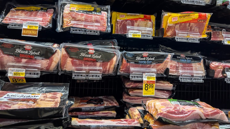 Refrigerated grocery display of bacon