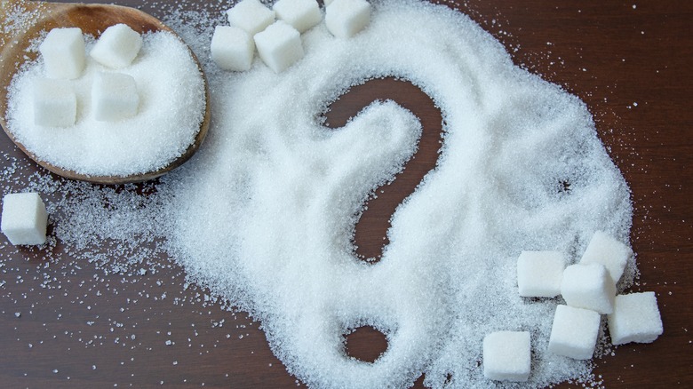 sugar pile and question mark