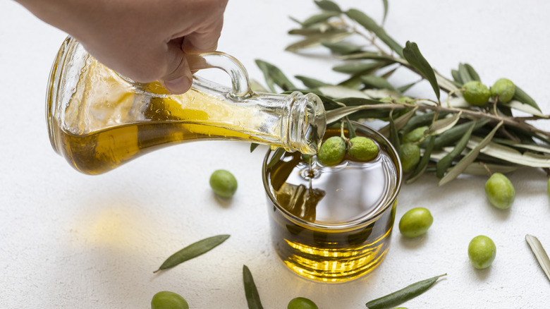 pouring olive oil