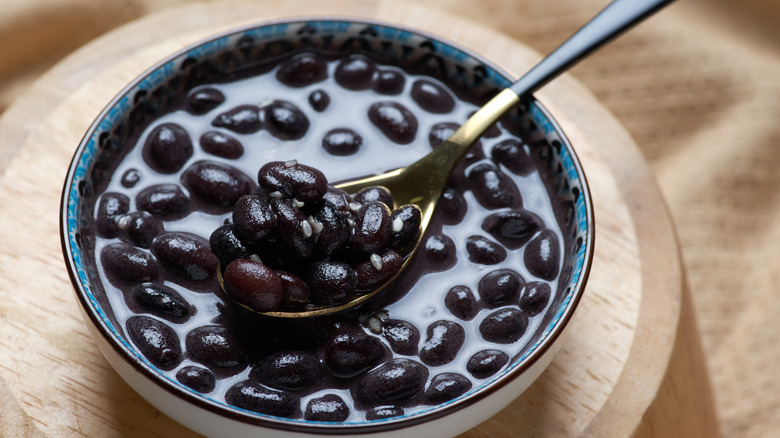 Black beans in bowl with spoon