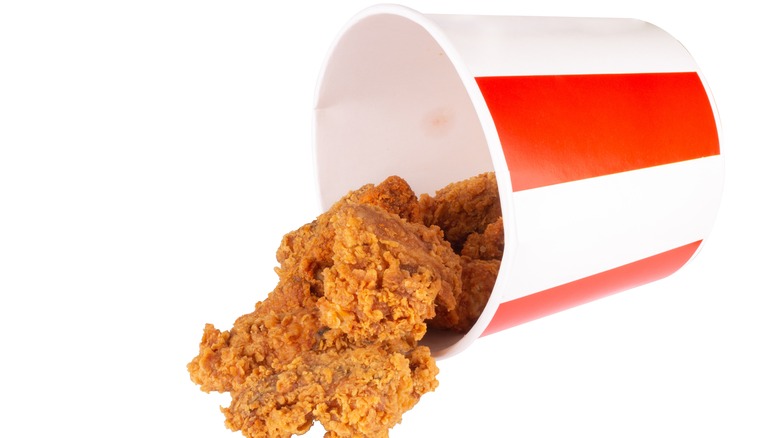 KFC chicken falling out of bucket