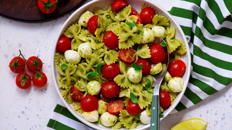 Bowl of Caprese-style pesto pasta salad