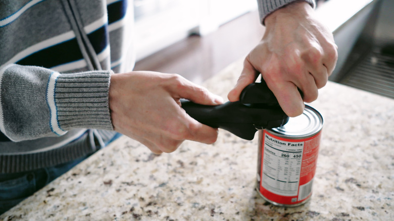 opening can of food