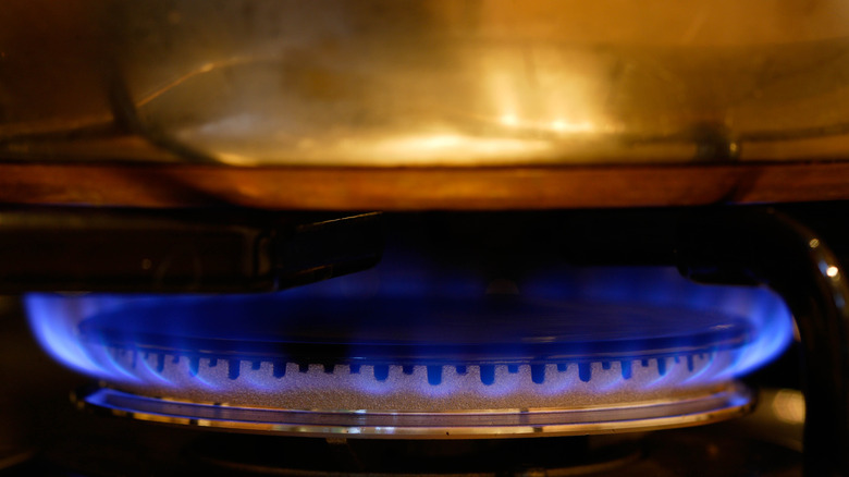 Flame under saucepan